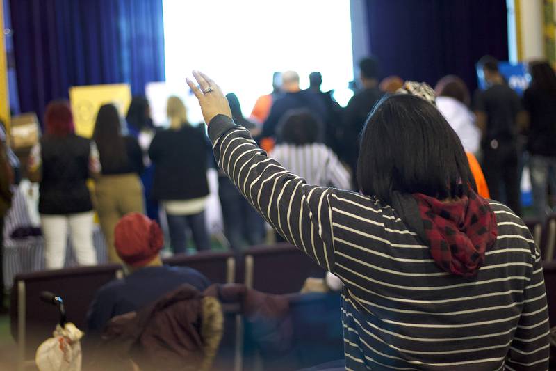 The audience praying at the Super Soul Bowl Sunday community event on Sunday, Feb. 8, 2026, at New Canaan Christian Church, 225 E. Clinton St., Joliet.