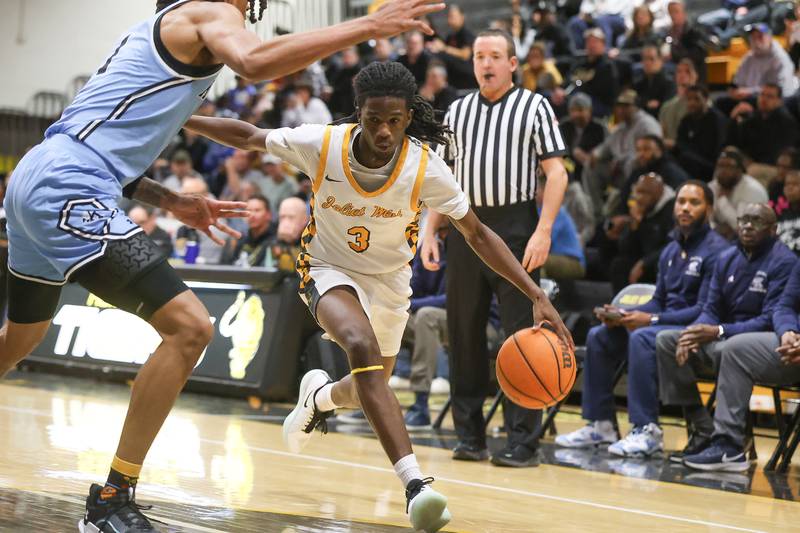 Joliet West’s Deven Triplett drives to the paint against Kankakee on Wednesday, Feb. 18, 2026 in Joliet.