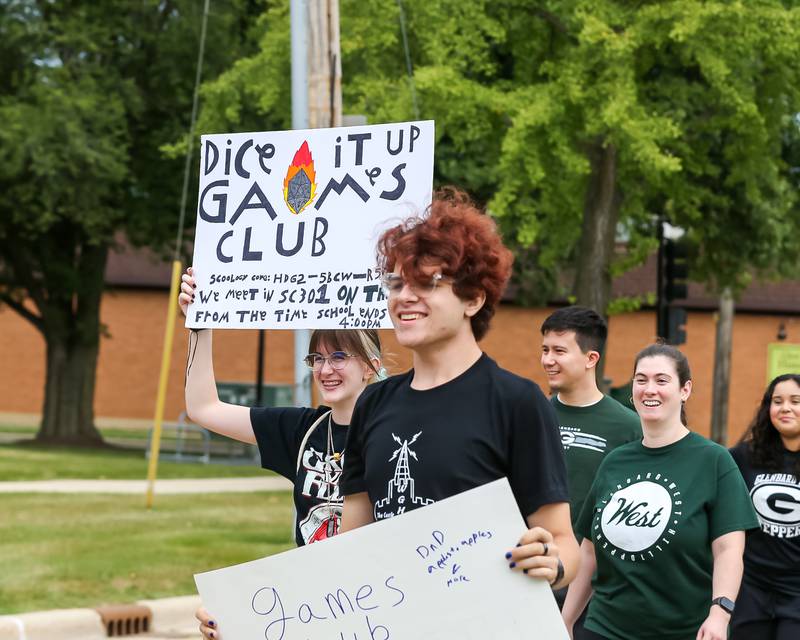 Students with the "Dice it up Games Club" march in the Glenbard West Homecoming Parade.  Sept 16, 2023