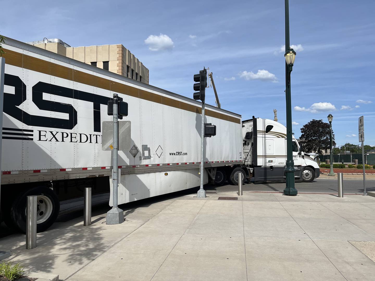 A semitrailer after jumping a curb on Wednesday, June 12, near the Will County Courthouse in Joliet.
