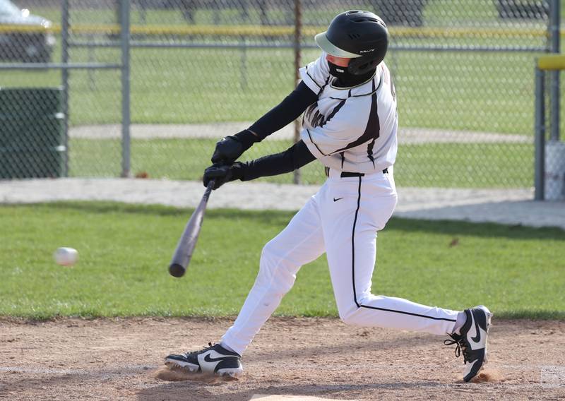 Sycamore's Benjamin Anderson makes contact Tuesday, April 7, 2026, during their game against Freeport at the Sycamore Community Sports Complex.