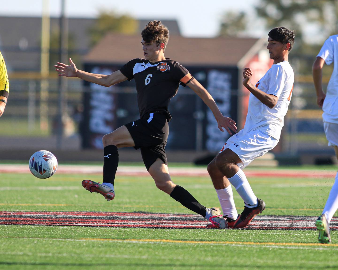 Wheaton Warrenville South's Chase Kedzior (6) eludes the defense during the Class 3A Plainfield North Regional final game between Oswego and Wheaton Warrenville South. Oct 22, 2022