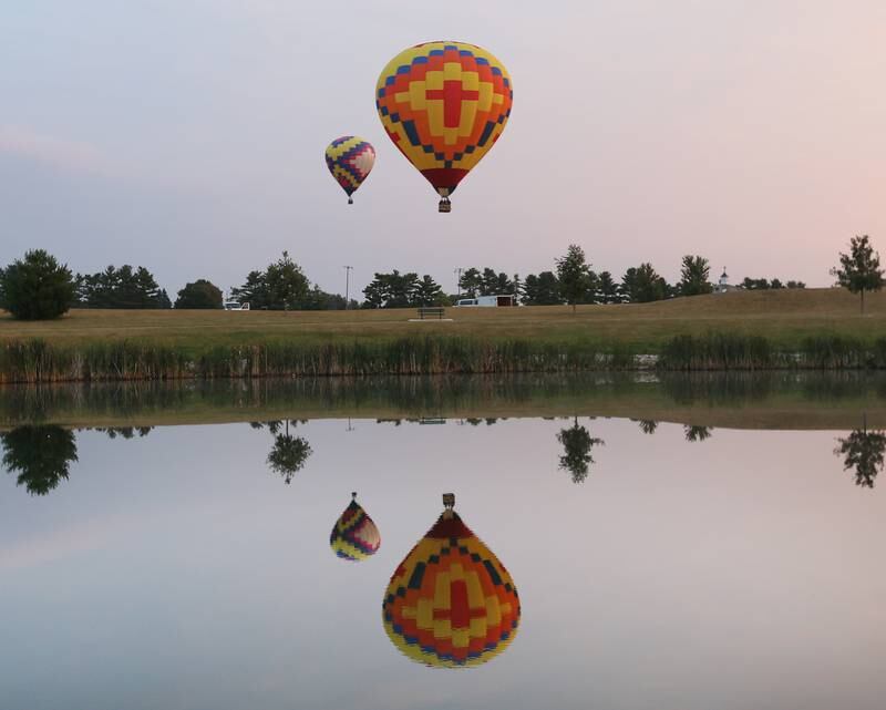 Hot air balloons take off at Zearing Park for the 52nd annual Homestead Festival on Sunday, Sept 10, 2023 in Princeton.