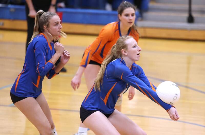 Genoa-Kingston's Kailey Kline bumps the ball Thursday, Oct. 27, 2022, during their Class 2A Regional final match against Marengo at Rosary High School in Aurora.