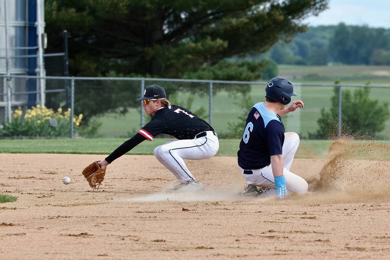 Bureau Valley's Elijah Endress slides in safely to second base in Thursday's regional semifinal game at Manlius. Orion won 6-0.
