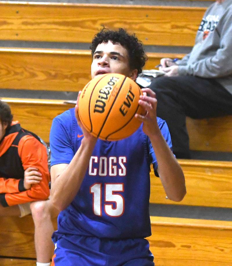 Genoa-Kingston's Charles "CJ" Rogers looks to shoot against Warren on Saturday, Dec. 13, 2025 at the 64th Annual Forreston Holiday Basketball Tournament at Forreston High School.