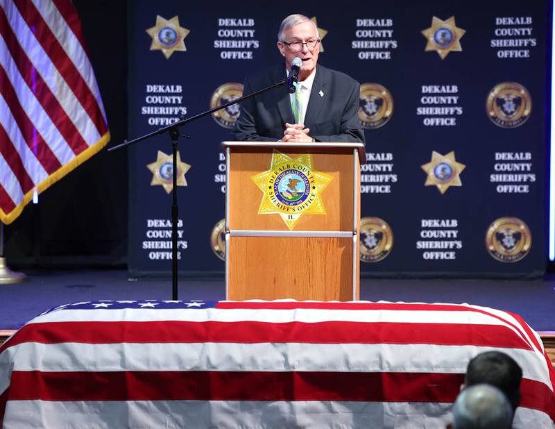 Barry Melton welcomes attendees to the memorial service for DeKalb County Sheriff Roger Scott Friday, March 7, 2025, at Bethany Road Bible Church in DeKalb. Scott, who was the county sheriff for 36 years, died on February 23 at the age of 78.