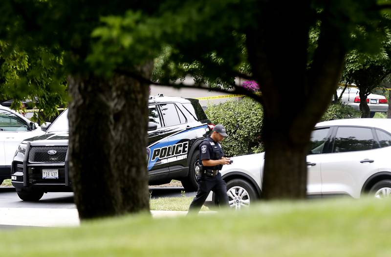 Officers from the McHenry County Sheriff and other departments investigate a domestic incident in which four people were killed on Wednesday Aug. 9, 2023, in the 5800 block of Wild Plum Road in unincorporated Crystal Lake. Police later said they were family members.