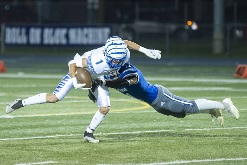 Princeton’s Brady Byers fights off Newman’s Gabe Padilla Friday, Sept. 30, 2022.
