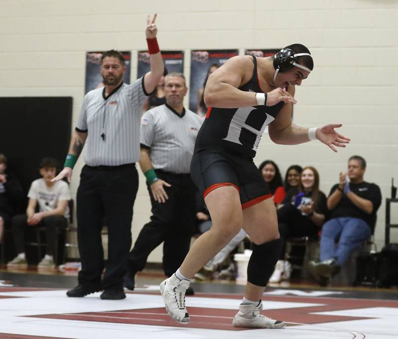 Huntley’s Markos Mihalopolus celebrates defeating Hampshire's Joseph Ochoa during the 285-pound match of a Fox Valley Conference wrestling match Wednesday, Jan. 24, 2024, at Huntley High School.