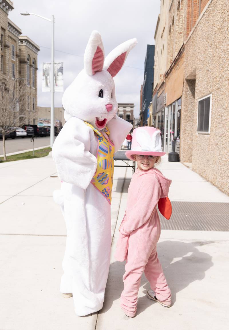 Pheiffer Thompson, 5, of Ottawa posed in her pink bunny outfit along with the official Easter Bunny Saturday, March 30, 2024, on Court Street in Ottawa. When asked which was the real Easter Bunny, Thompson excitedly replied, "We both are!"