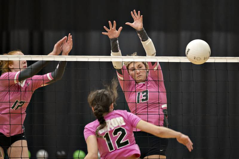 Rock Falls’ Claire Bickett goes up to block a shot Thursday, Oct. 13, 2022 against Dixon.