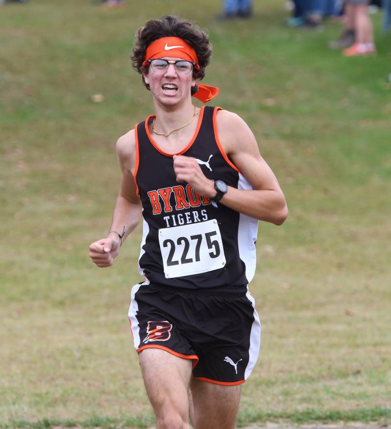 Byron's Tim Starwalt sprints to the finish line at the Amboy Columbus Day Cross Country Invitational held at Shady Oaks Country Club near Amboy on Monday, Oct. 13, 2025. He finished third.