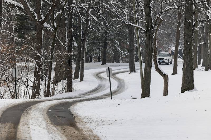 A blanket of snow coats roads and trees at Sinnissippi Park in Sterling on Wednesday, Jan. 25, 2023.