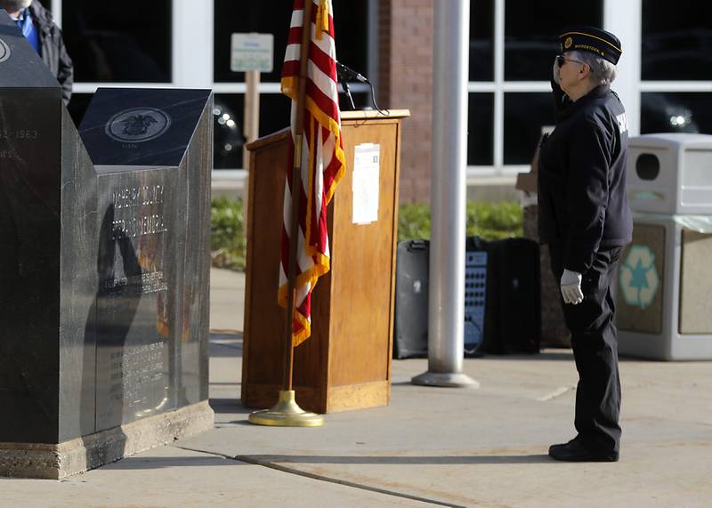 U.S. Army veteran Lou Ness salutes McHenry County veterans who during in the Vietnam War died the “Voices from Vietnam,” program on Friday, March 29, 2024, at the McHenry County Government Administration Building in Woodstock. The program was the first time that McHenry County honored Vietnam veterans on Vietnam War Veterans Day. The day, that was created by federal law enacted in 2017, honors the more than 2.7 million American men and women who served in Vietnam.