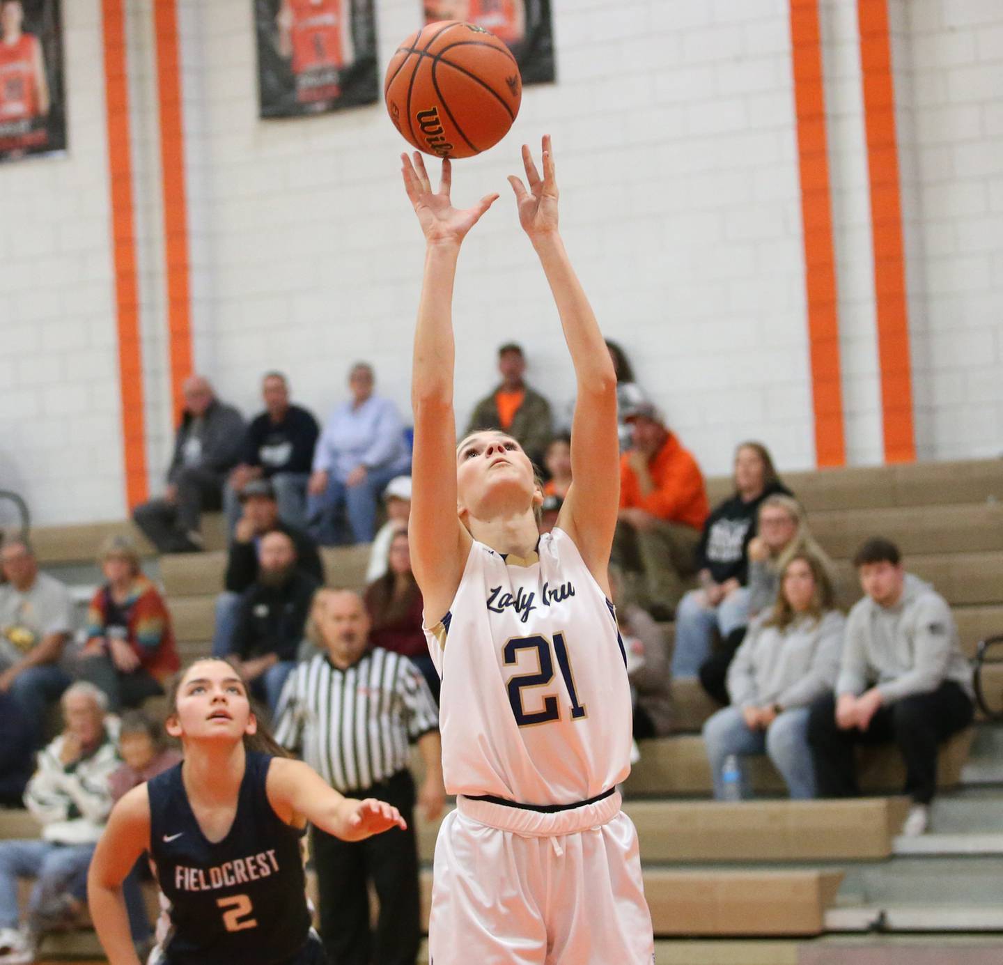 Marquette's Avery Durdan shoots a jump shot in the lane over Fieldcrest's Pru Mangan during the Integrated Seed Lady falcon Basketball Classic tournament on Monday, Nov. 13, 2023 at Flanagan High School.