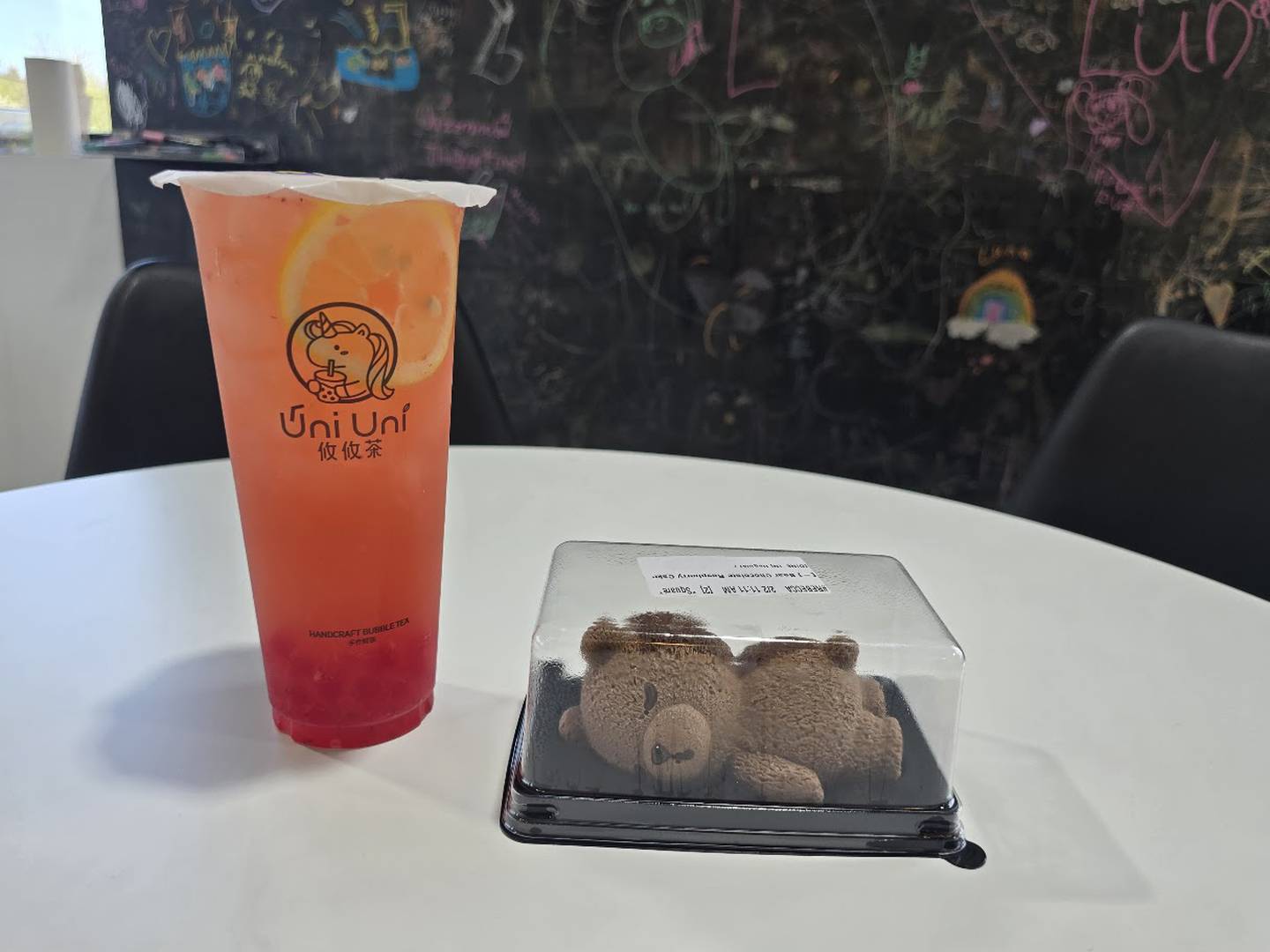 Uni Uni Boba Joliet, located at 1504 Essington Road, Suite 1 in Joliet, is seen on Tuesday, April 14, 2026. Pictured is the strawberry lemon jasmine green tea with strawberry popping bob and a bear chocolate raspberry cake.