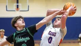 Photos: Genoa-Kingston boys basketball meets North Boone in Class 2A regional