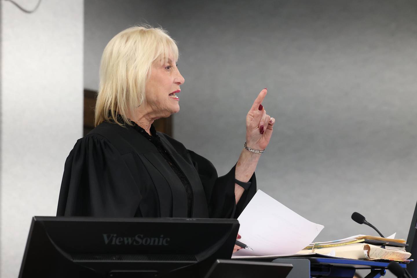Judge Kathy Bradshaw-Elliott addresses the defendant Xandria Harris and the two attorneys present to represent Harris' case attorney Cierra Norris during proceedings on Aug. 7, 2025