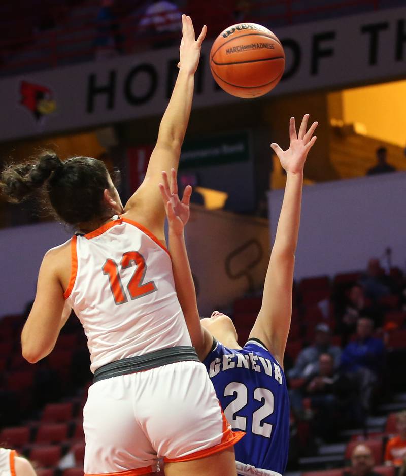 Geneva's Leah Palmer looks to grab a rebound over Hersey's Natalie Alesia during the Class 4A third place game on Friday, March 3, 2023 at CEFCU Arena in Normal.