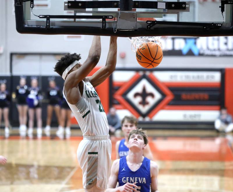 Glenbard West's Logan Glover dunks the ball during the Class 4A St. Charles East Sectional final against Geneva on Friday, March 7, 2025 in St. Charles.