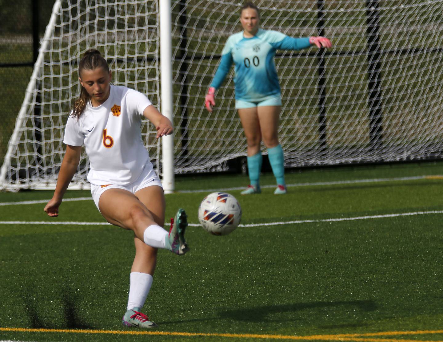 Richmond-Burton's Charlotte Gentry kicks the ball away during an IHSA Class 1A Cristo Rey St. Martin Sectional semifinal girls soccer match against Willows Academy on Tuesday, May 26, 2026 at Cristo Rey St. Martin College Prep, in Waukegan.