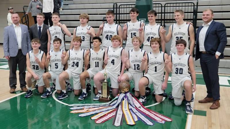 The Fieldcrest boys basketball team defeated Eureka 48-44 in the championship game of the 111th McLean County/Heart of Illinois Conference Tournament on Saturday night at Illinois Wesleyan University's Shirk Center. The Knights also took possession of the league's traveling trophy with the victory.