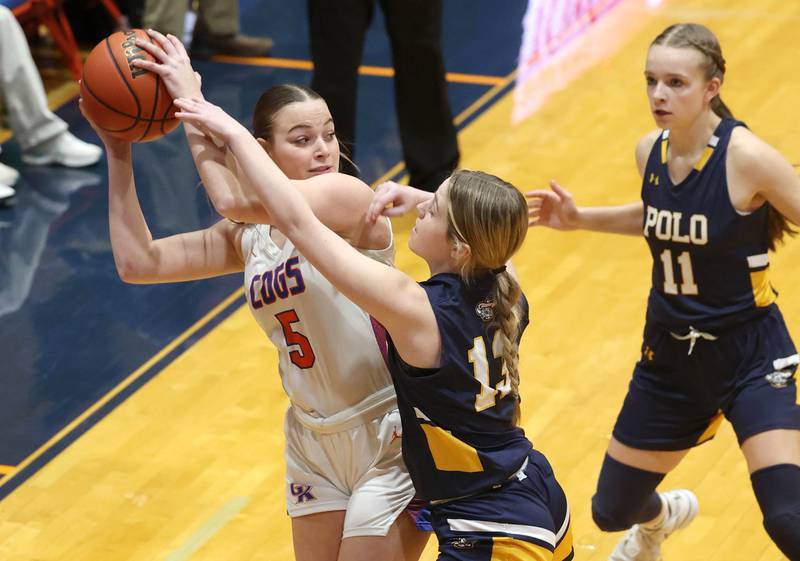 Genoa-Kingston's Zoe Boylen looks to pass as Polo's Madison Glawe plays defense during their game Monday, Jan. 29, 2024, at Genoa-Kingston High School.