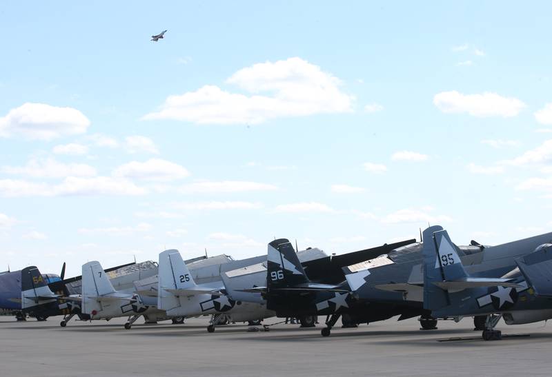 The F-16 Demo Viper Team aircraft flies over TBM aircrafts during the 10th annual TBM Avenger Reunion and Airshow on Saturday, May 17, 2025 at the Illinois Valley Regional Airport in Peru.