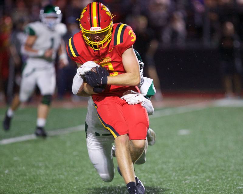 Batavia's Thomas Prescott runs the ball against Glenbard West on Friday, Aug.29,2025 in Batavia.