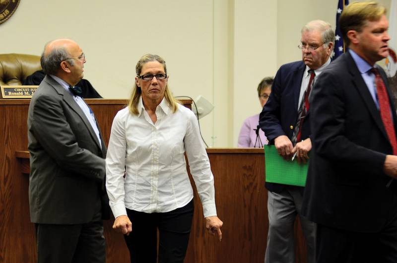 Former Dixon comptroller Rita Crundwell leaves the Lee County courtroom Monday, Oct. 22, 2012 after making her first appearance in Lee County on charges of stealing from the city.
