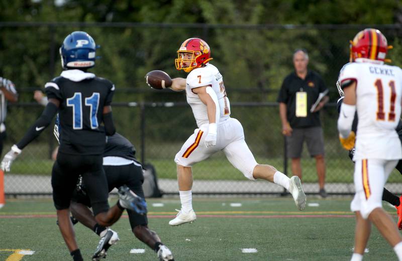 Batavia’s Tyler Jansey (7) scores a touchdown during a game against Phillips at Gately Stadium in Chicago on Saturday, Aug. 27, 2022.