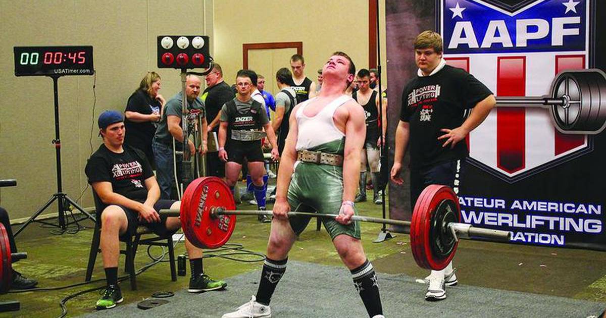 Milton High student beats world records in weightlifting