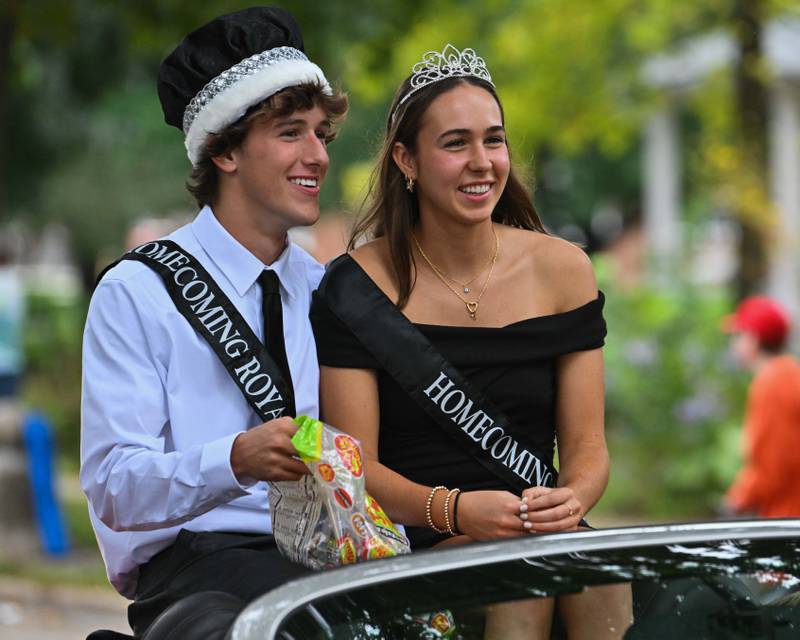 Crystal Lake Central H.S. homecoming king and queen seen during their 100 year anniversary homecoming day parade on Saturday, Sep. 16, 2023 in Crystal Lake. The parade began at the high school and made its way through downtown Crystal Lake.