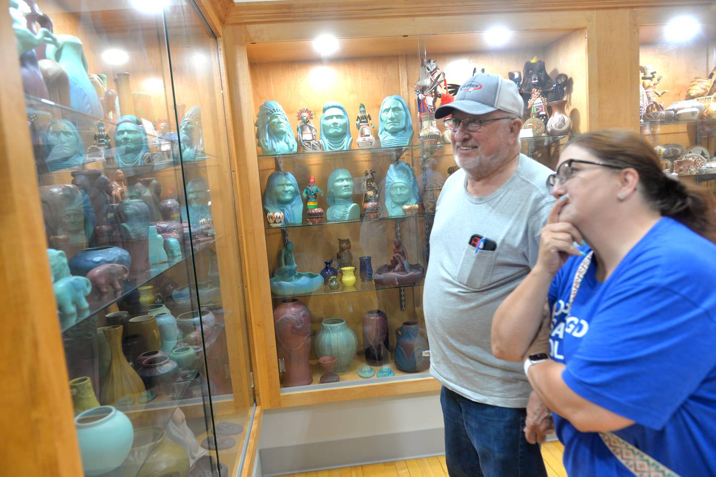 Anne Stevens and her dad, Don, of Oregon, look at some of the items on display in one of the rooms at the CMAAA's grand opening on Friday, July 14, 2023.