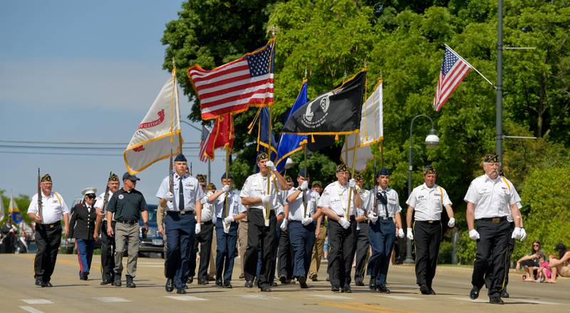 St. Charles Memorial Day Parade Color Guard heads up the procession down Main Street on Monday, May 29, 2023.