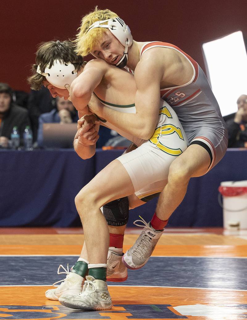 Coal City’s Cooper Morris (left) works against Vandalia’s Tyson Waughtel in the 126 pound weight class of the 1A state individual wrestling finals Saturday, Feb. 22, 2025, at State Farm Center in Champaign.