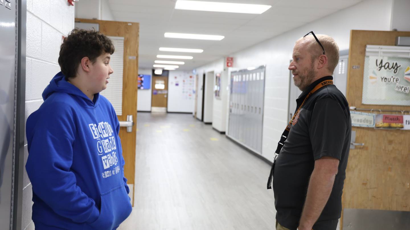 Greg Eiserman, McHenry High School District 156 Freshman Campus principal, chats with freshman Mason Sandoz on Tuesday, March 18, 2025, at the school.  Eiserman has been tapped to lead the district's 10-12 grade Upper Campus as its principal next year.