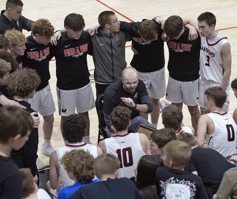 Woodland Warrior Head Coach Connor Malinke instructs the team during the closing minutes of their Regional victory over Newark Friday at the Woodland Regional.