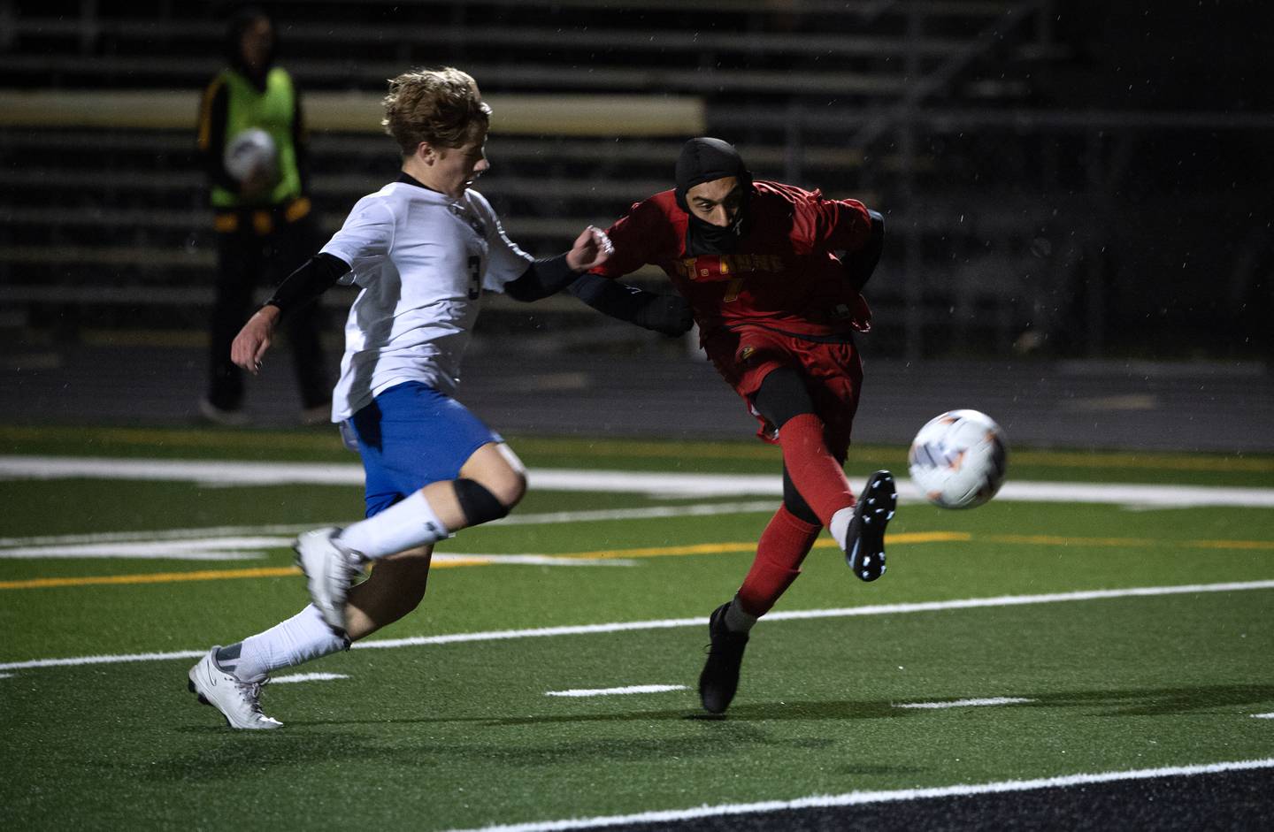 St. Anne's Diego Guerrero, right, takes a shot as goal as Clifton Central's Ryder Williamson, left, defends in a regional match-up on Tuesday, October 21, 2025.