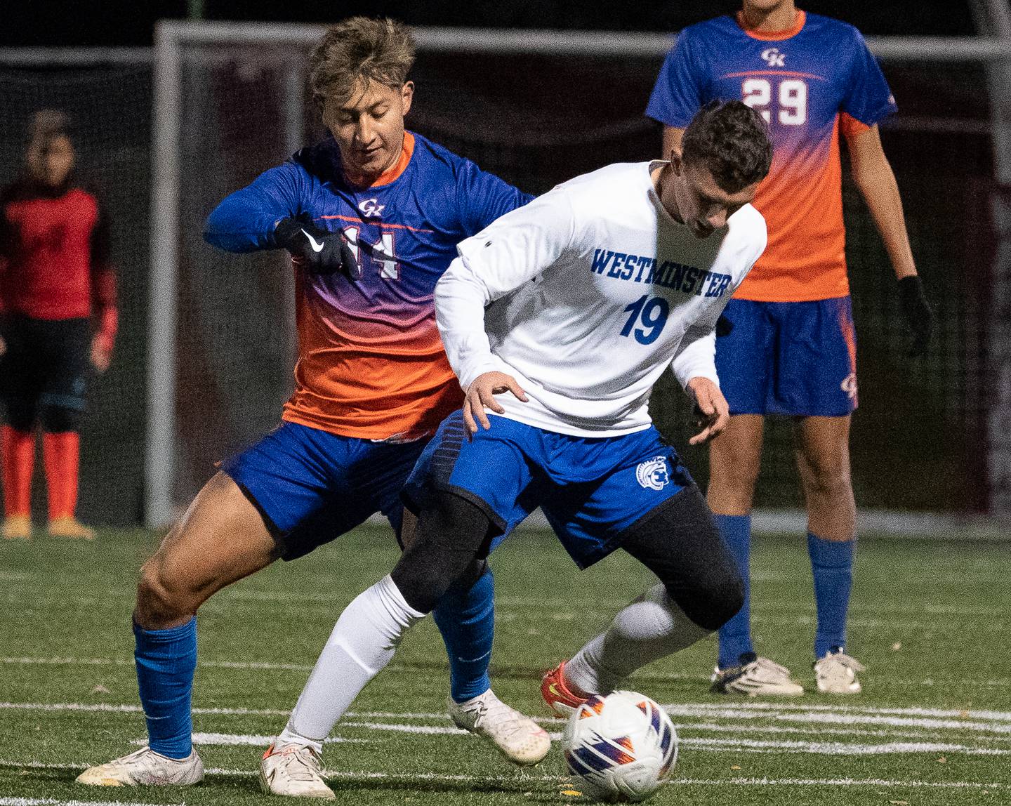 Westminster Christian's Peter DiNapoli (19) plays the ball against Genoa-Kingston's Diego Espinoza (14) during a Wheaton Academy 1A sectional semifinal match at Wheaton Academy on Tuesday, Oct 18, 2022.