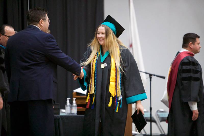 Gabriella Hagen receives her diploma at Woodstock North's Graduation Ceremony on Saturday, May 13, 2023 in Woodstock.