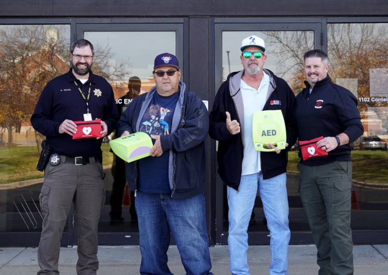 Pictured from left are Deputy Briars, John and Ken from the Yorkville Moose Lodge and Undersheriff Bobby Richardson.