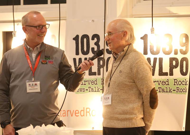 John Spencer, Starved Rock Media president interviews former WLPO sports director Lanny Slevin stage during the WLPO 75th Anniversary party on Wednesday, Nov. 16, 2022 at Senicas Oak Ridge in La Salle.