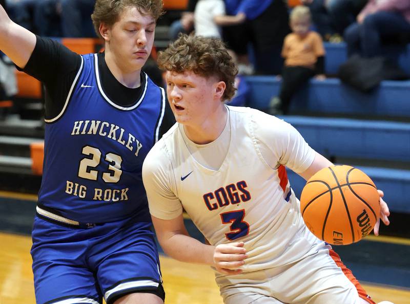 Genoa-Kingston's Jack Peterson goes baseline against Hinckley-Big Rock's Luke Badal Tuesday, Jan. 6, 2026, during their game at Genoa-Kingston High School.