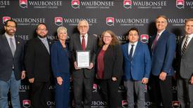 Waubonsee Community College Board honors departing trustee with resolution and honorary title
