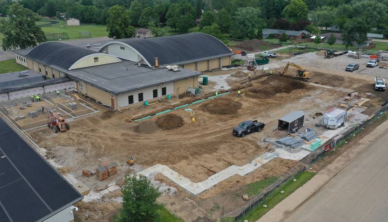 Crews from MCP Midwest work on the new Henry-Senachwine High School academic wing addition on Monday, June 9, 2025 in Henry.