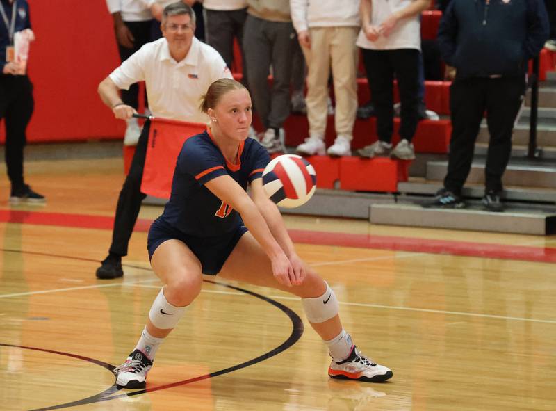 Oak Park-River Forest’s Grace Nelson (11) receives the ball against Willowbrook during the 4A girls varsity volleyball sectional final match at Hinsdale Central high school on Wednesday, Nov. 1, 2023 in Hinsdale, IL.