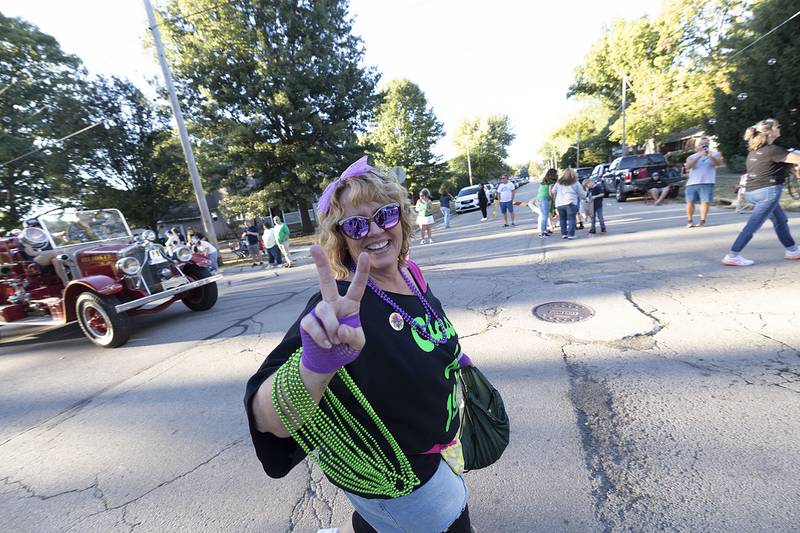 Alumni from the Class of ’85 march through the Rock Falls homecoming parade Thursday, Sept. 25, 2025.