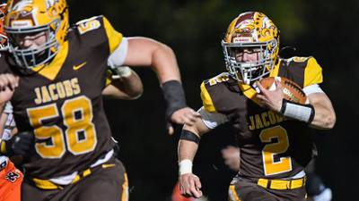 Jacobs’ offensive line clears path to Class 7A quarterfinals